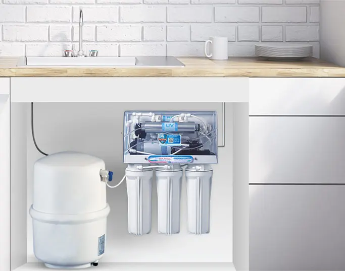 Professional under-sink reverse osmosis water filter installation in Tenerife home with drinking water tap